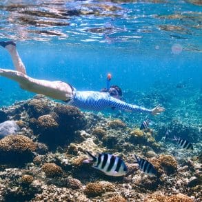 girl enjoying the best snorkeling in the Cayman Islands