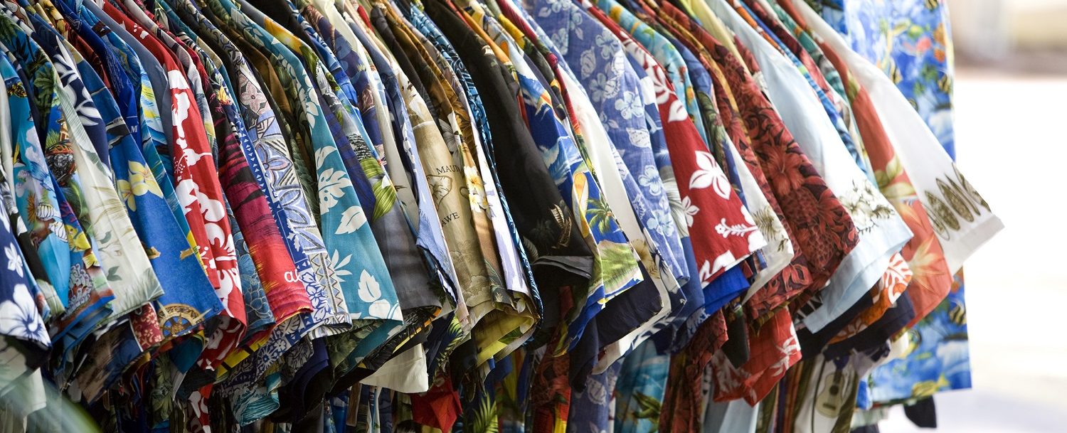 grand cayman shopping area displaying rack of Hawaiian shirts
