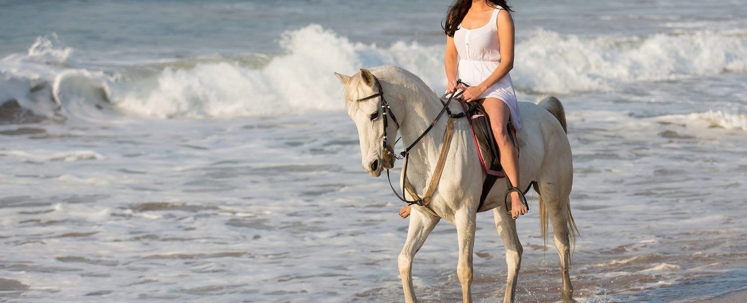 Girl enjoying Grand Cayman horseback riding