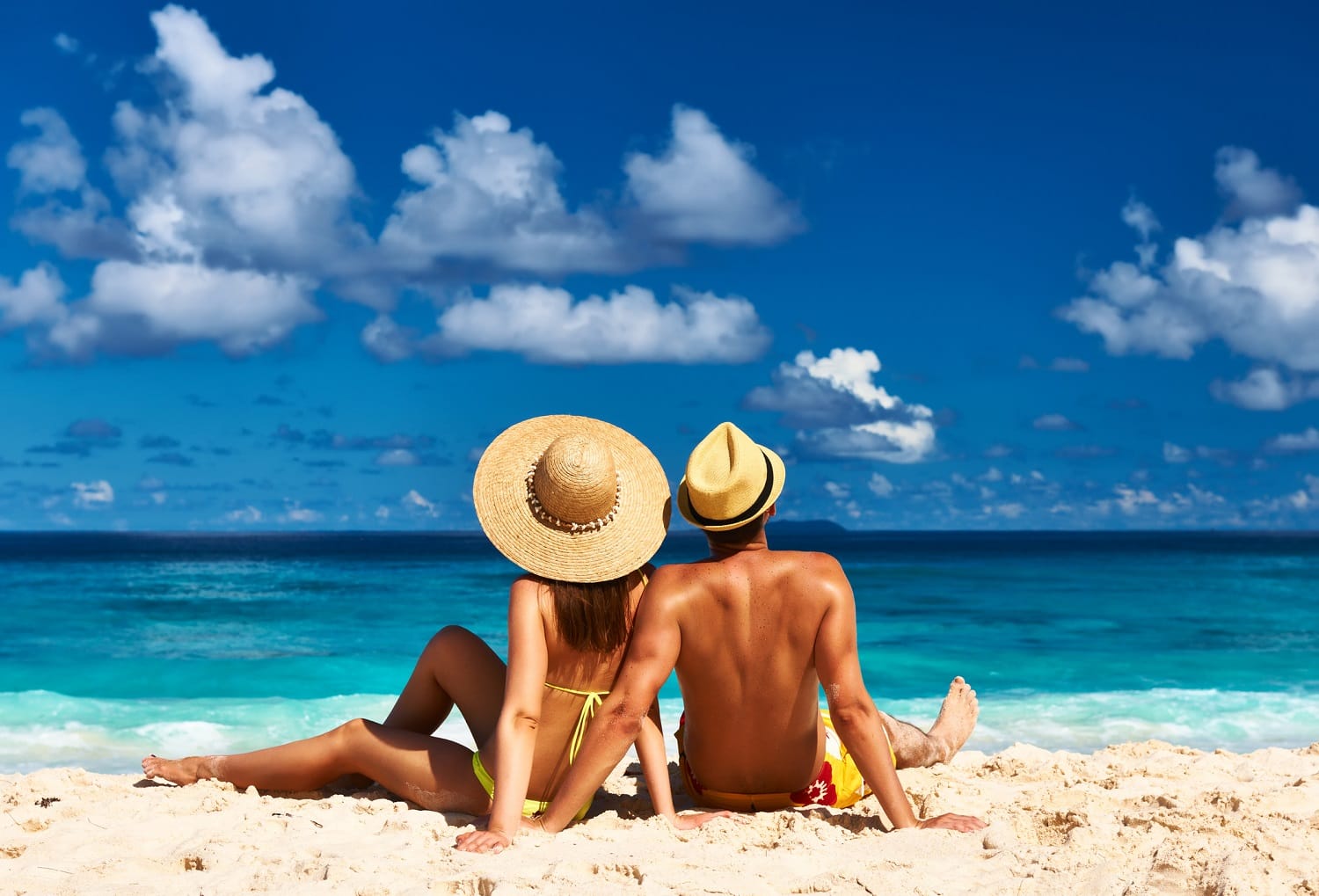 Couple on a tropical beach at Grand Cayman 