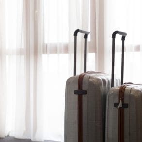 Suitcase or luggage bag in a modern hotel room