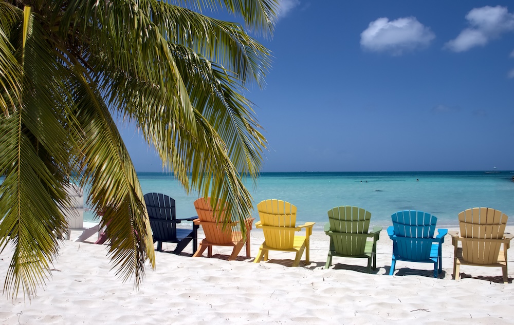 Colorful beach chairs on the Caribbean coast.