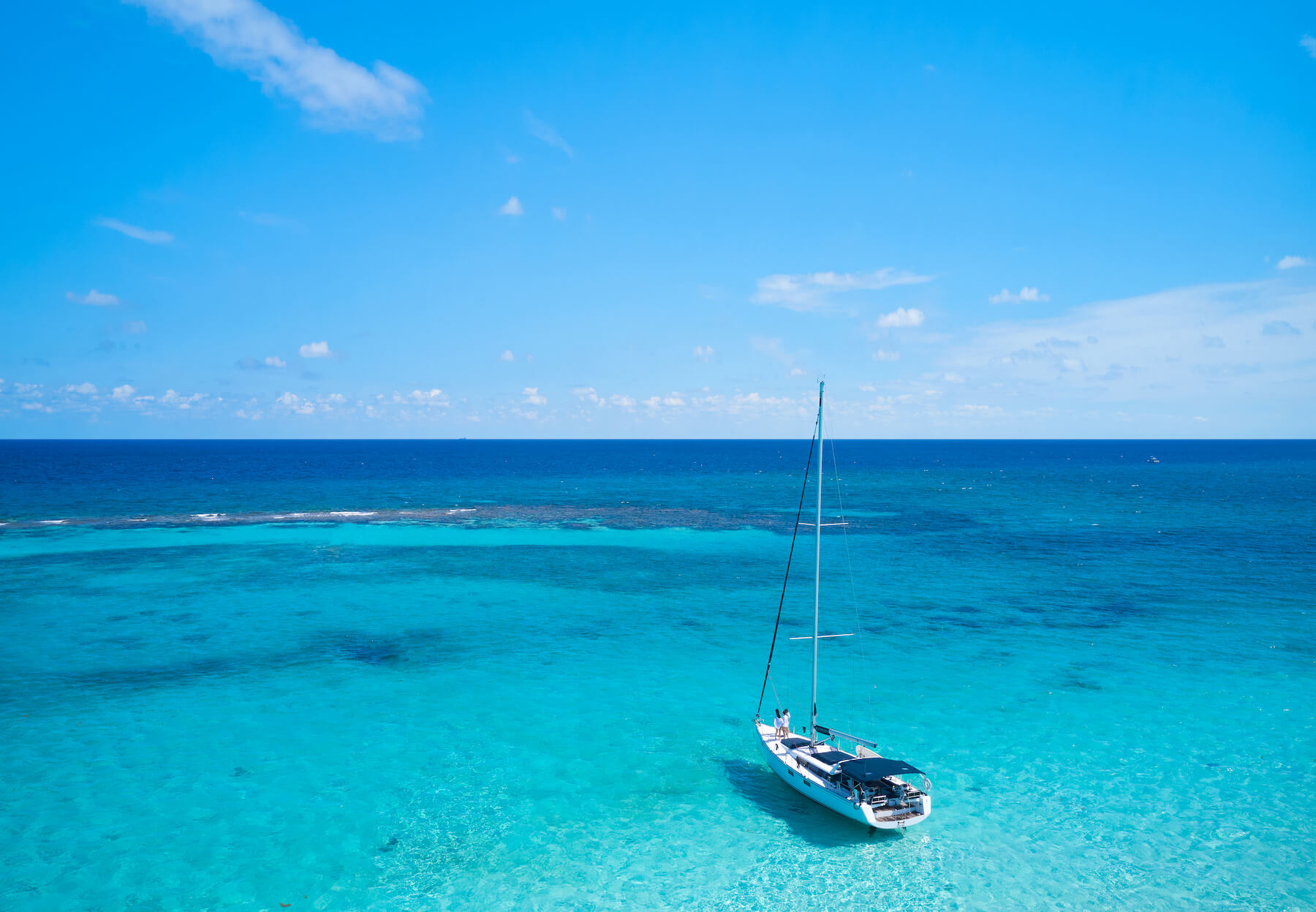 catamaran anchored on the clear blue waters of grand cayman