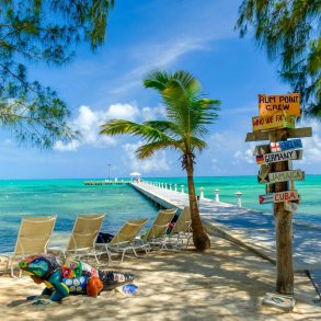 Grand Cayman, Cayman Islands, Rum Point Beach with view on the Caribbean Sea and a jetty